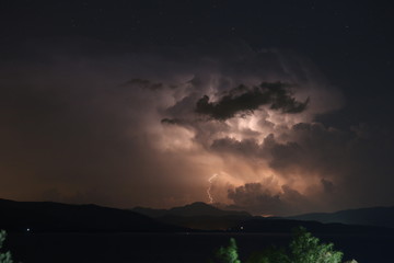 Thunder Storm over Mountains and Sea