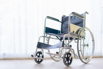 Fototapeta na wymiar Wheelchair in medical office.