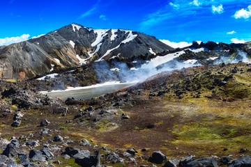 Amazing nature landscape, lava field and color volcanic mountains Landmannalaugar in the Fjallabak nature reserve, Iceland, scenic panoramic view, outdoor travel background