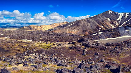 Amazing nature landscape, lava field and color volcanic mountains Landmannalaugar in the Fjallabak nature reserve, Iceland, scenic panoramic view, outdoor travel background