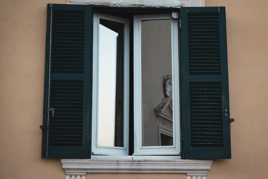 reflections in the windows in the italian town