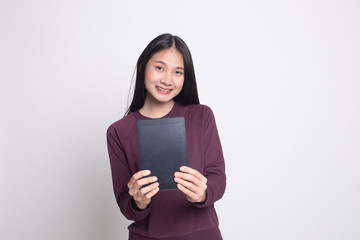 Young Asian woman with a computer tablet.