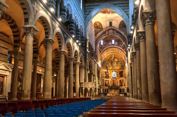 Fototapeta premium Bright interior of 11th century Roman Catholic cathedral with tall columns
