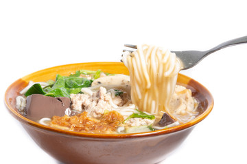 Vietnamese rice noodles cooked in Thai style on white background