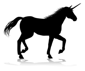 A unicorn silhouette mythical horned horse graphic