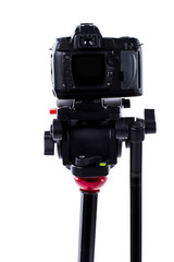 Digital photo camera on tripod. Professional photo camera isolated on white background. Studio...