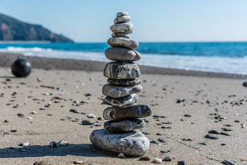 Stone Stack on a Beach in Southern Italy