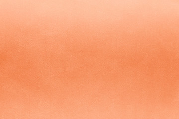 Elegant orange textile background. Silk cloth texture. Fabric pattern.