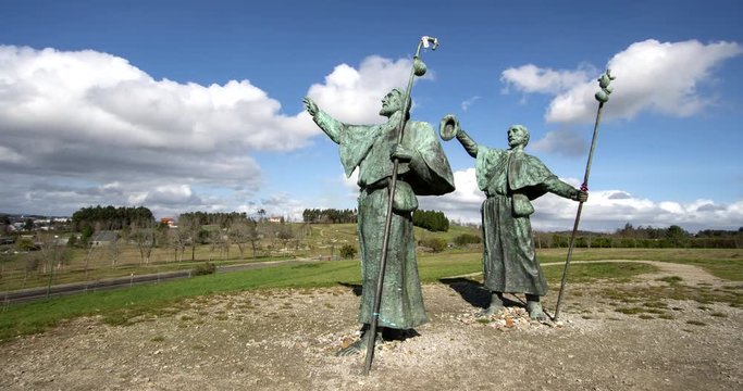 Statue of Pilgrims on Monte do Gozo in Santiago de Compostela, Spain. Timelapse 4K video. Way of St. James, pilgrimage