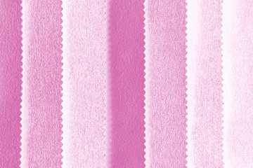 Elegant pink textile background. Silk cloth texture. Fabric pattern.