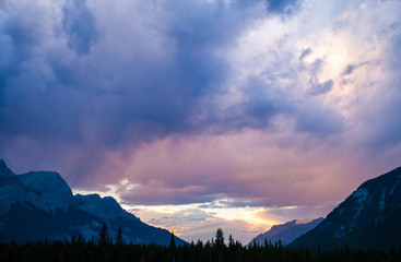 Storm clouds at sunset in the Canadian Rocky Mountains near Canmore, Alberta, Canada