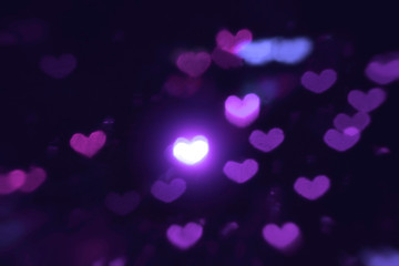 Purple Hearts. St. Valentine's Day. Dark background. Romantic