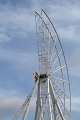 A Partly Constructed Large Big Wheel Amusement Ride.