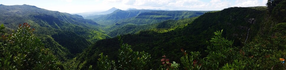 Fototapeta premium panorama of the mountains with tropical forest at mauritius