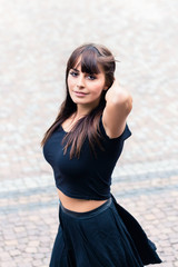 Fototapeta premium Beautiful young woman on street