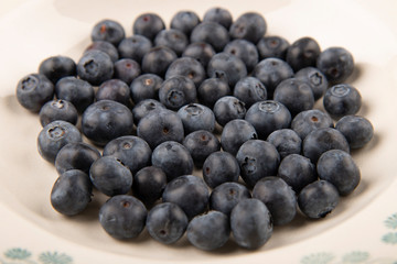 A plate with blueberries