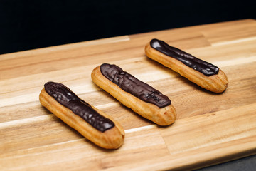 Eclair crisp creamy cake with white and dark  chocolate