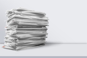 File folders with documents on white table