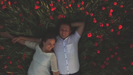 Marriage proposal at field of flowers at happy womens day
