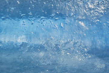 The texture of the ice. The frozen water.Winter background  