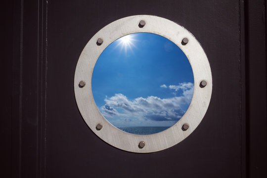 porthole or window with sea and horizon