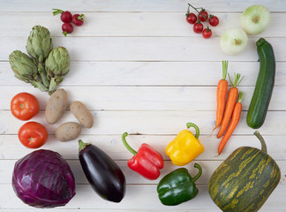 Top view of raw vegetables for posters and healthy food menus. Organic agricultural products. Vegan food.