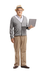 Senior gentleman standing with a laptop