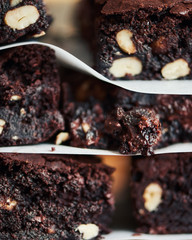 Delicious freshly baked stack of nutty chocolate brownies