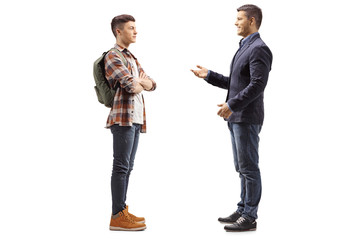 Young boy listening to a man talking