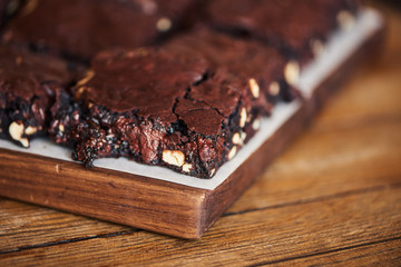 Freshly baked gooey chocolate brownies sitting on a table