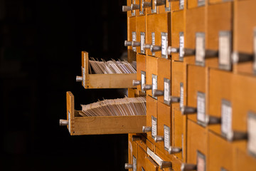 Old library reference catalogue with  opened card drawer