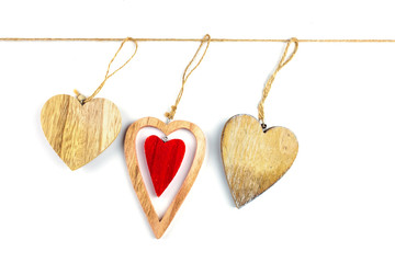 Valentine Day background with decorative hearts on wood. Isolated. Place for text.