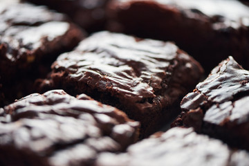 Homemade chocolate brownies cooling on a bakery table