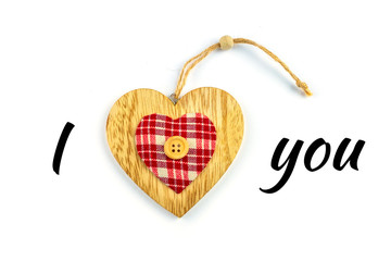 Valentine Day background with decorative hearts on wood. Isolated image  with an inscription i love you.