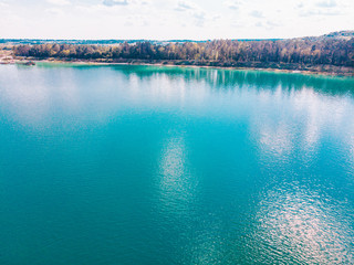 aerial view of lake with blue water