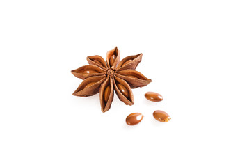 Anise star with anise seed on white