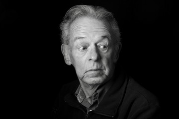 Fototapeta premium Portrait of an old man with facial expression
