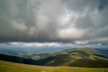 Obraz na płótnie Canvas Rain clouds above Carpathians. Panorama of Borzhava ridge of the Ukrainian Carpathian Mountains