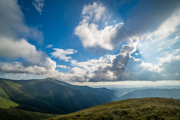 Landscape of Borzhava ridge of the Ukrainian Carpathian Mountains. Clouds above Carpathians