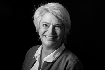 Portrait of a mature woman doing facial expressions