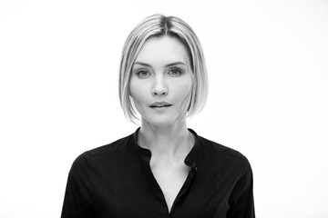 Black and white portrait of a beautiful woman on a white background