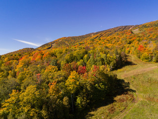 Aerial view of some rural fall color landscape over Mont Orford