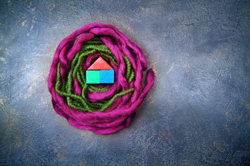 Wooden nest on dark background