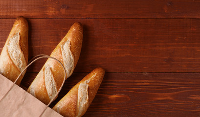 fresh bread in a paper bag. small bakery concept with gluten free flavored bread