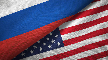 Russia and United States two flags textile cloth, fabric texture