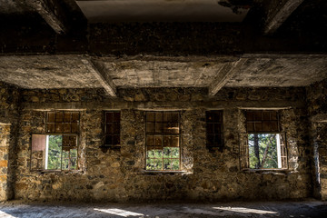 Fototapeta na wymiar Interior of Berengaria abandoned hotel in mountain region of Trodos, Cyprus