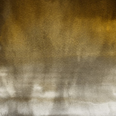 Gold luxury ink and watercolor textures on white paper background. Paint leaks and ombre effects. Hand painted abstract image.