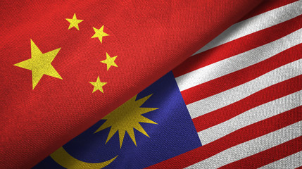 China and Malaysia two flags textile cloth, fabric texture