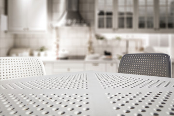 White kitchen table with chairs and free space for your decoration. 