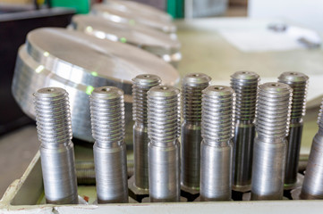 Bolts and parts after turning on the rack.